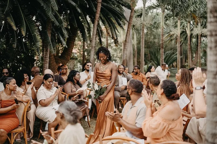 bridesmaid walking down the aisle