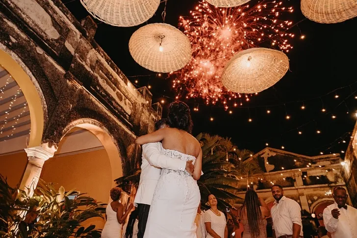 bride and groom watching fireworks