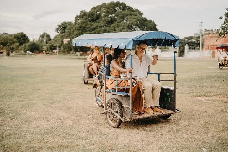 wedding guests being transported to wedding ceremony