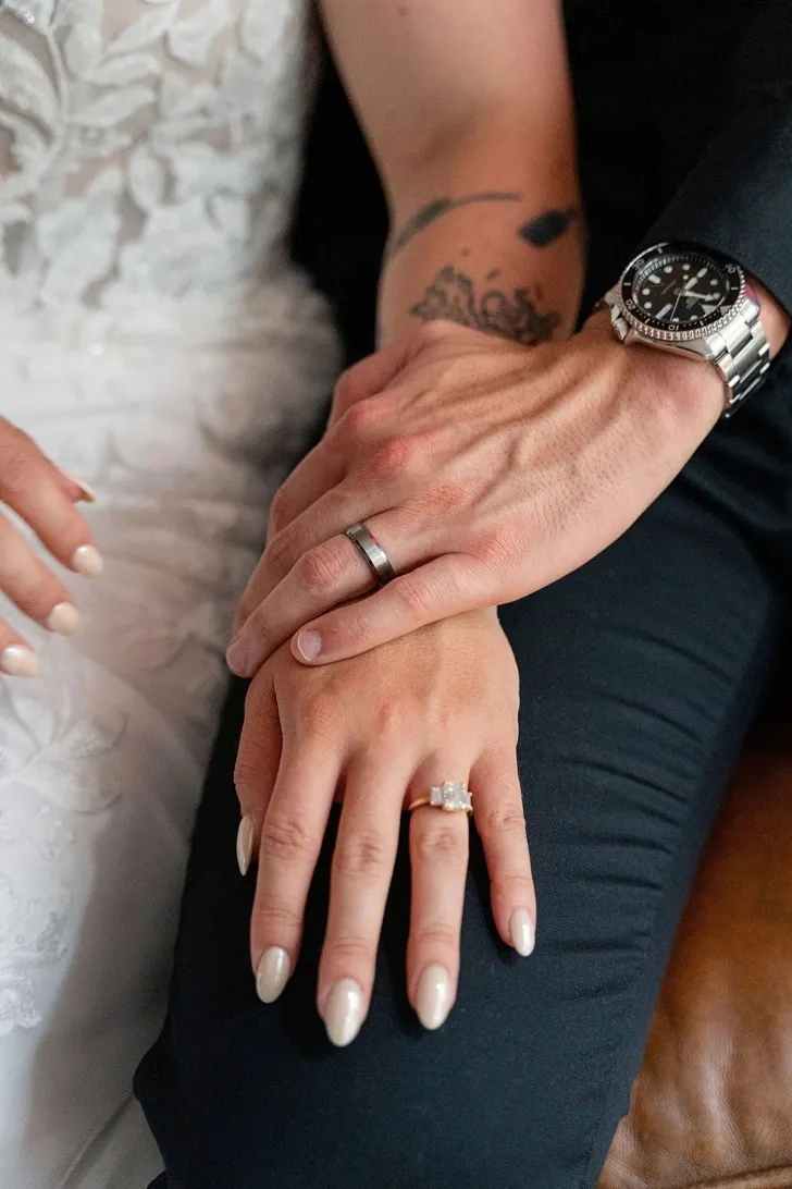 bride and groom's engagement and wedding bands