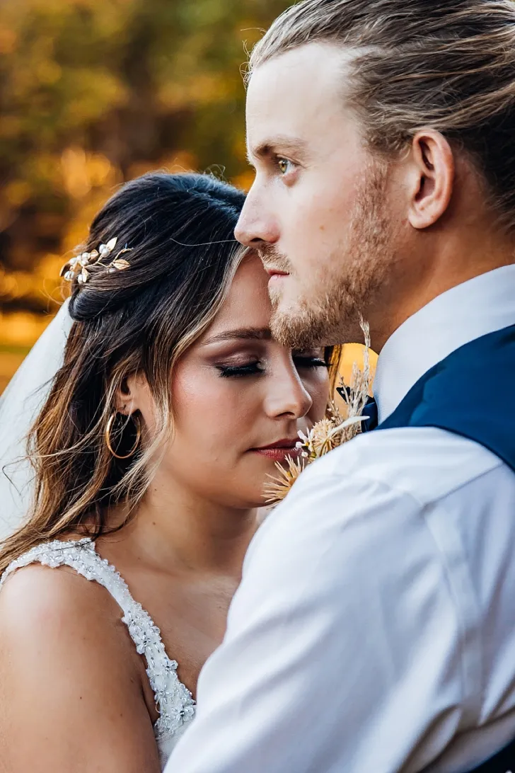 bride and groom embracing